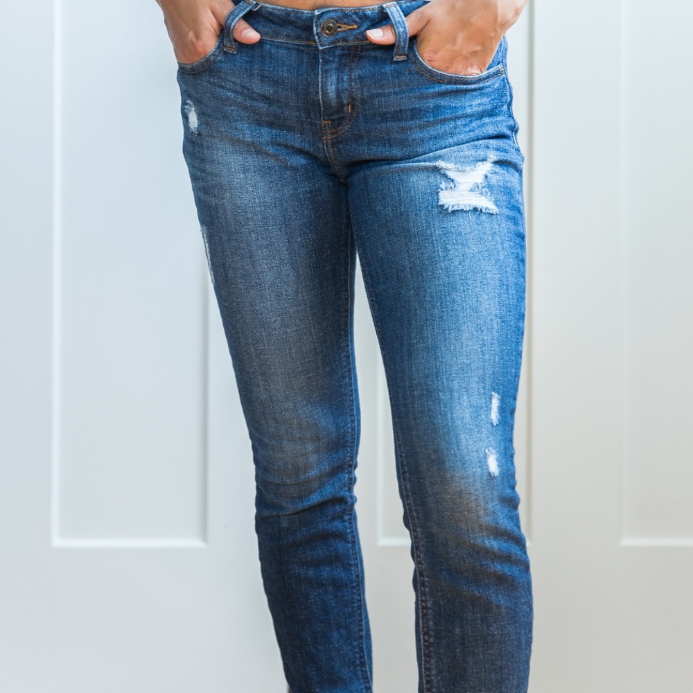 Fake ripped skinny jeans